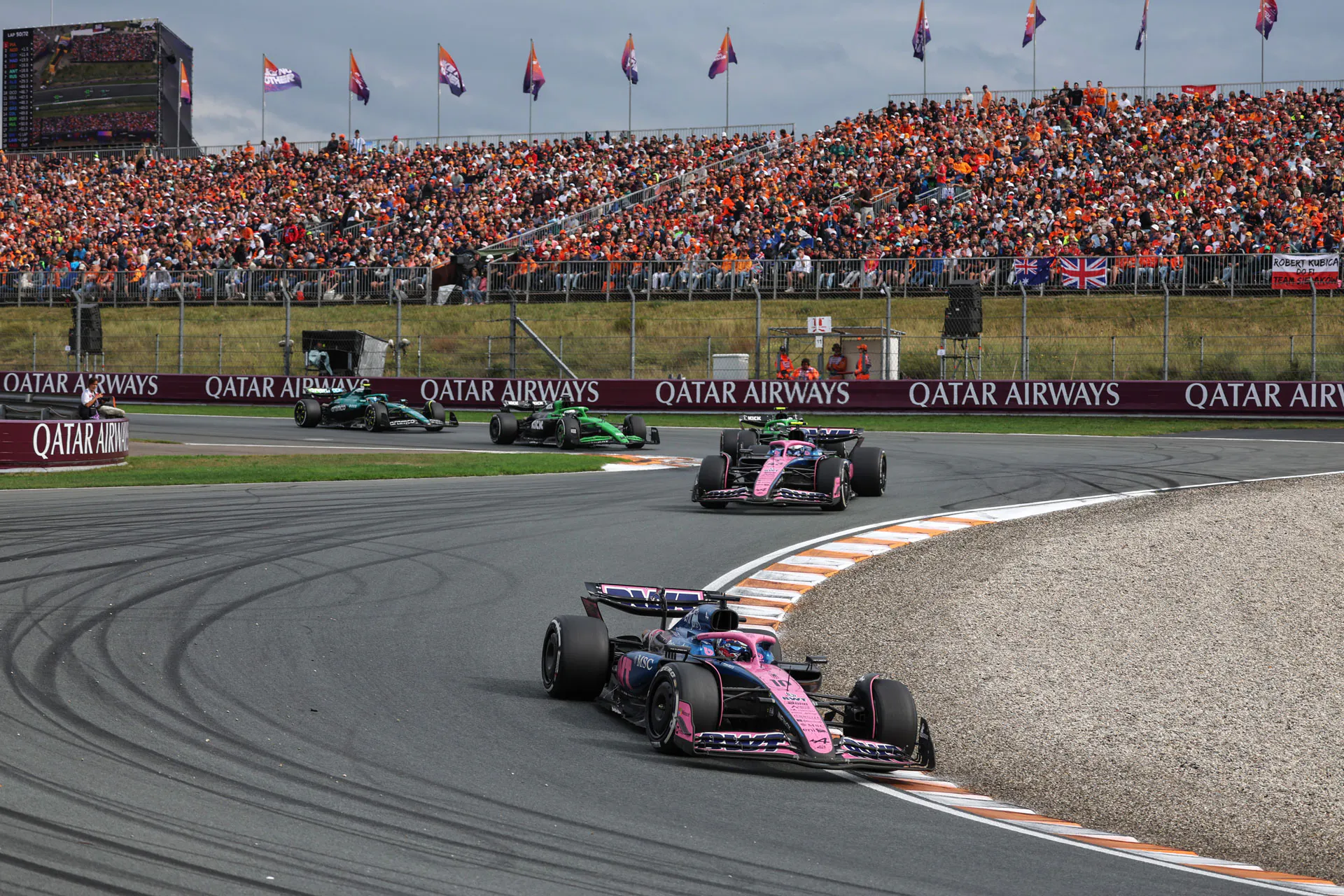 Zandvoort circuit with cars on the sweeping corners