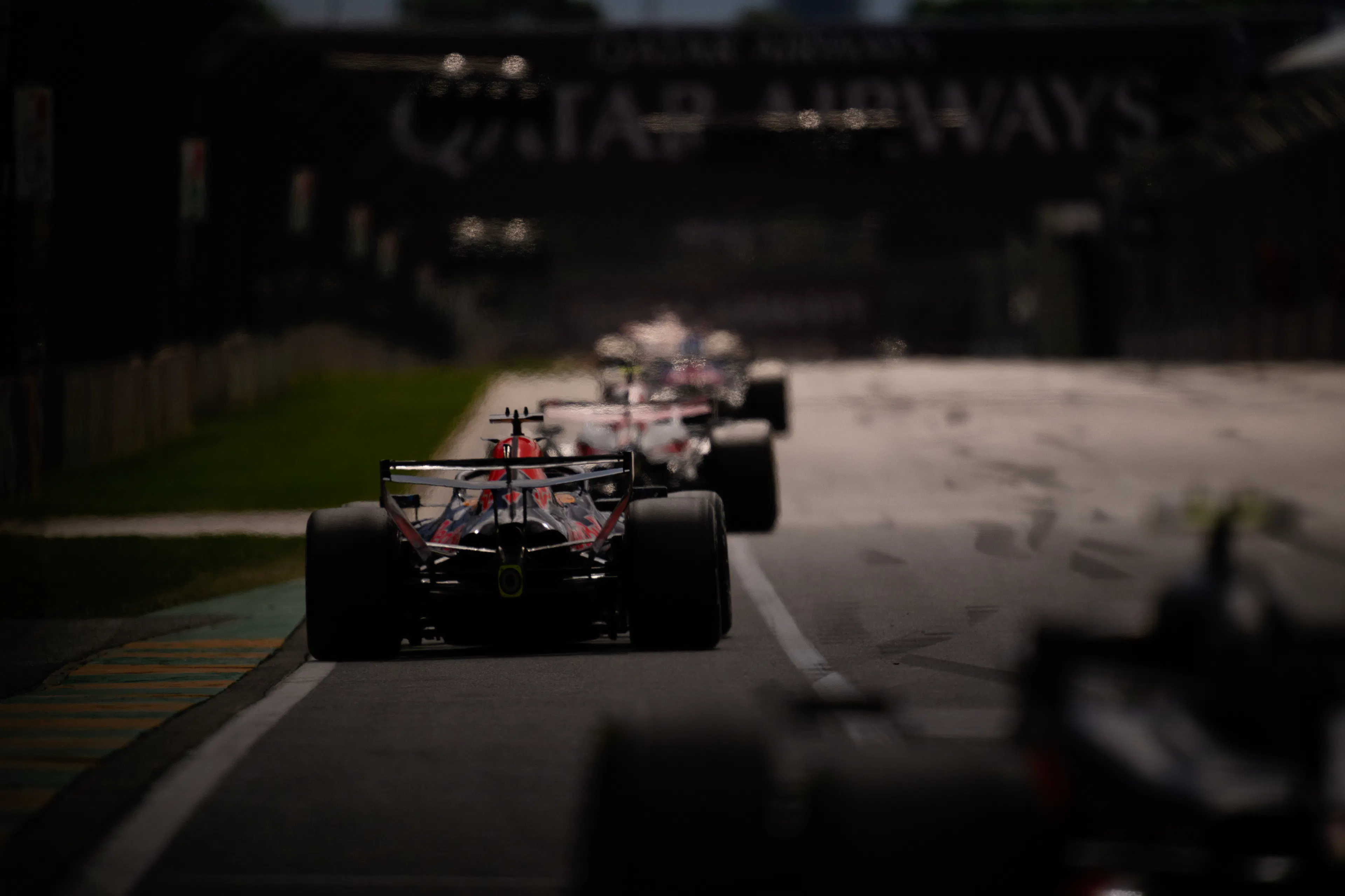 A line of F1 Cars from behind