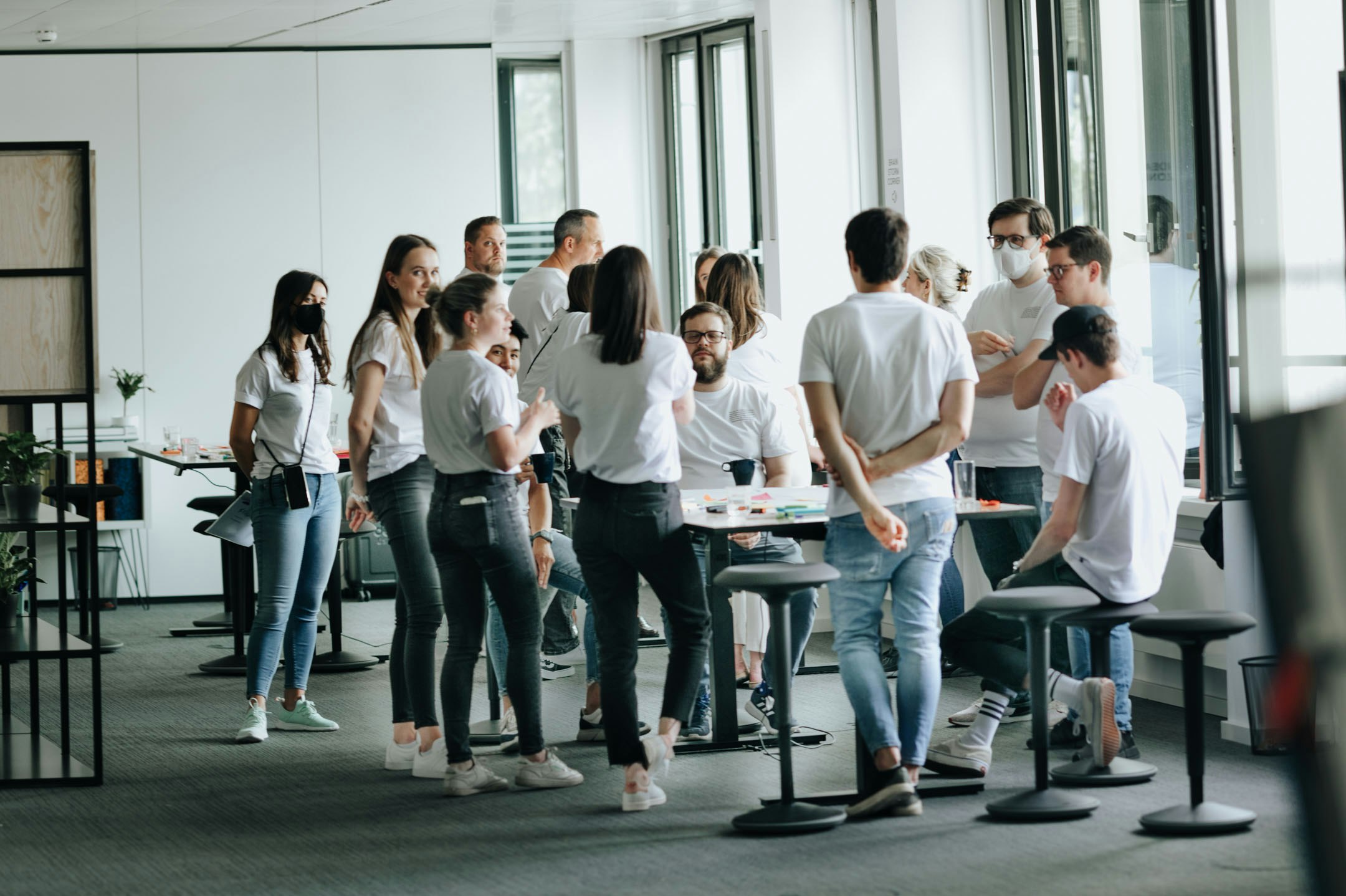 Group of Flip employees wearing white T-shirts