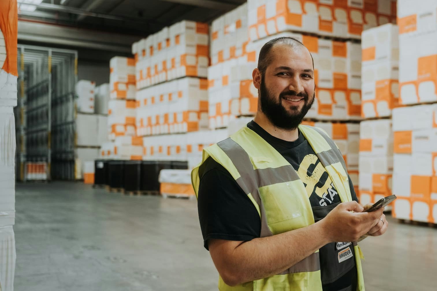 Employee in a warehouse using the app