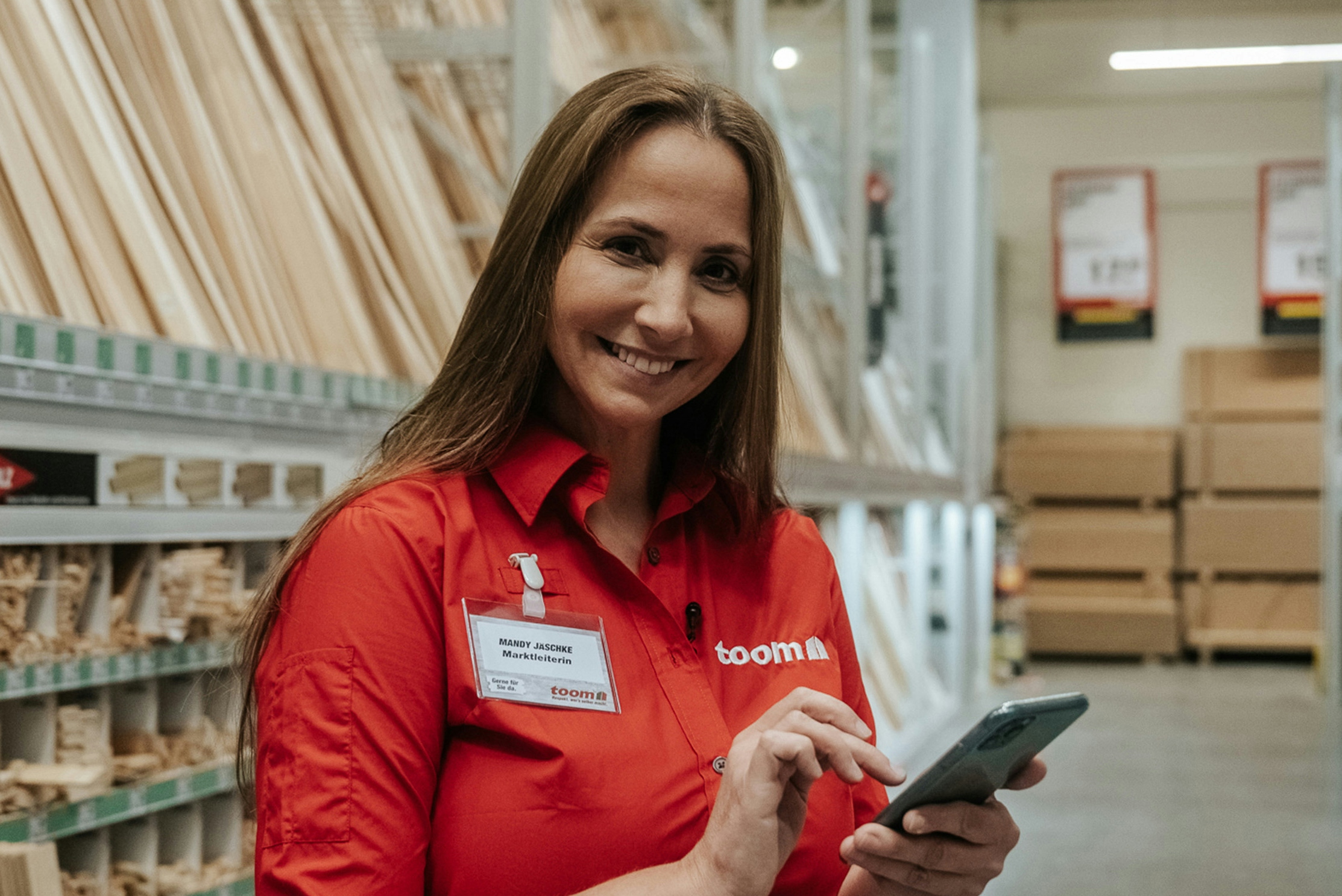 Mandy Jäschke wears a red toom shirt