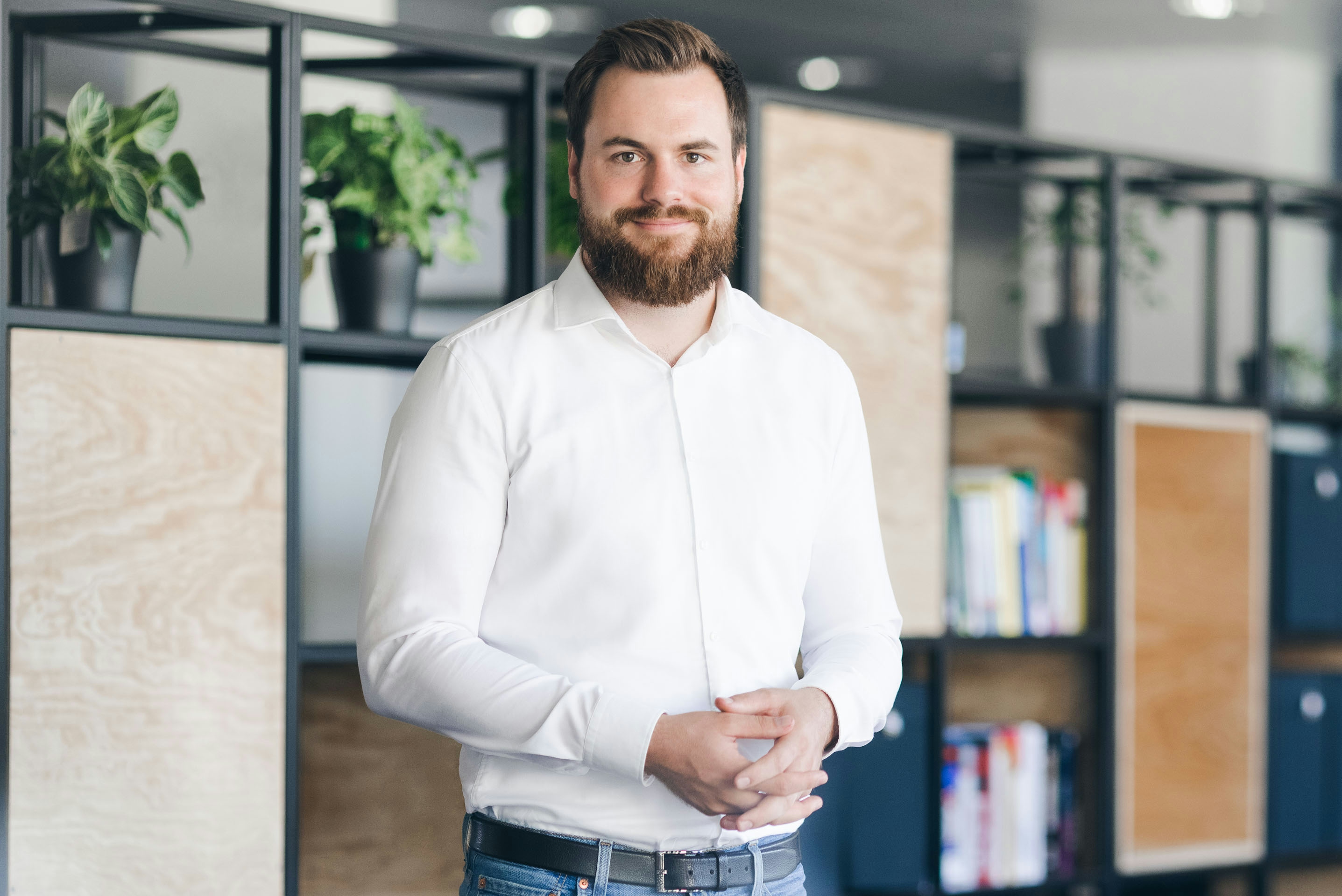 Benedikt Ilg stands in the Flip office 