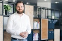 Benedikt Ilg stands in the Flip office