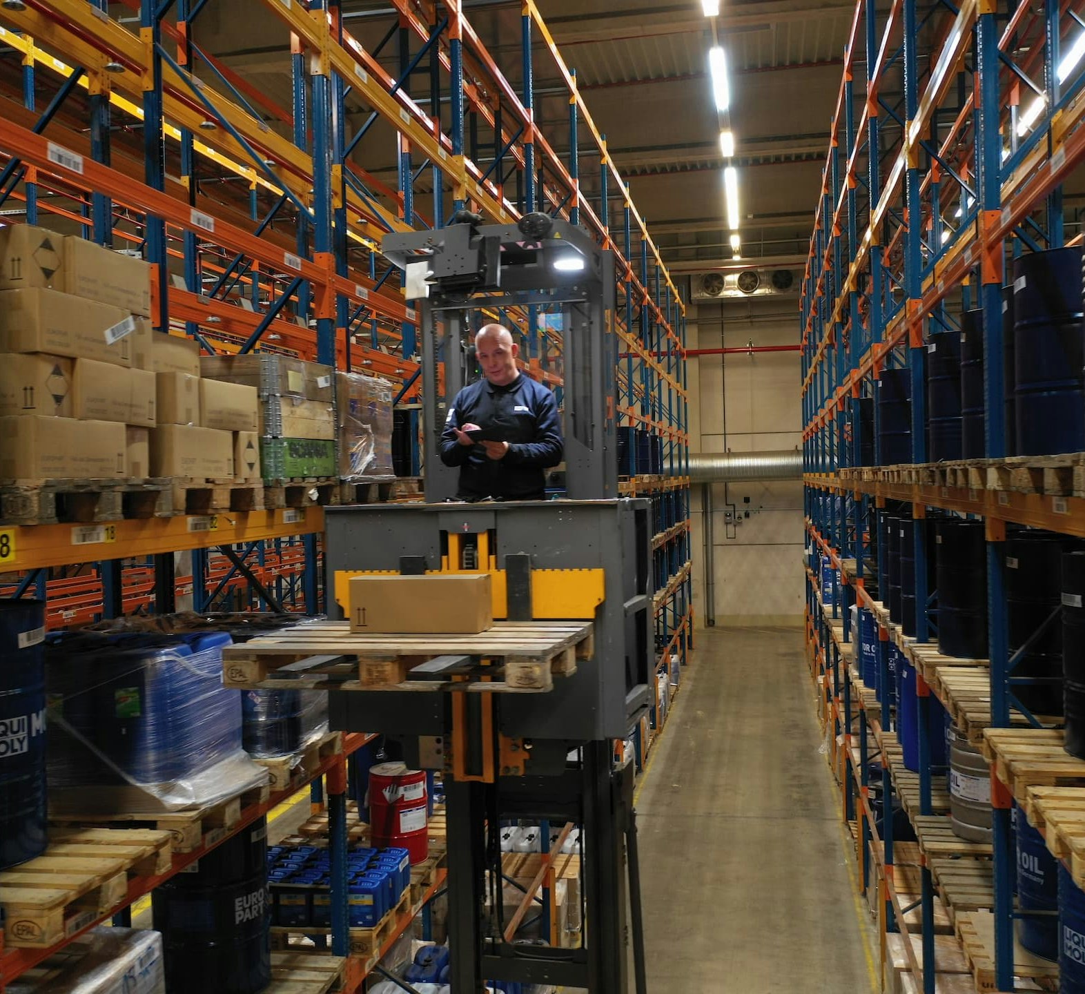 An employee using the app in a warehouse