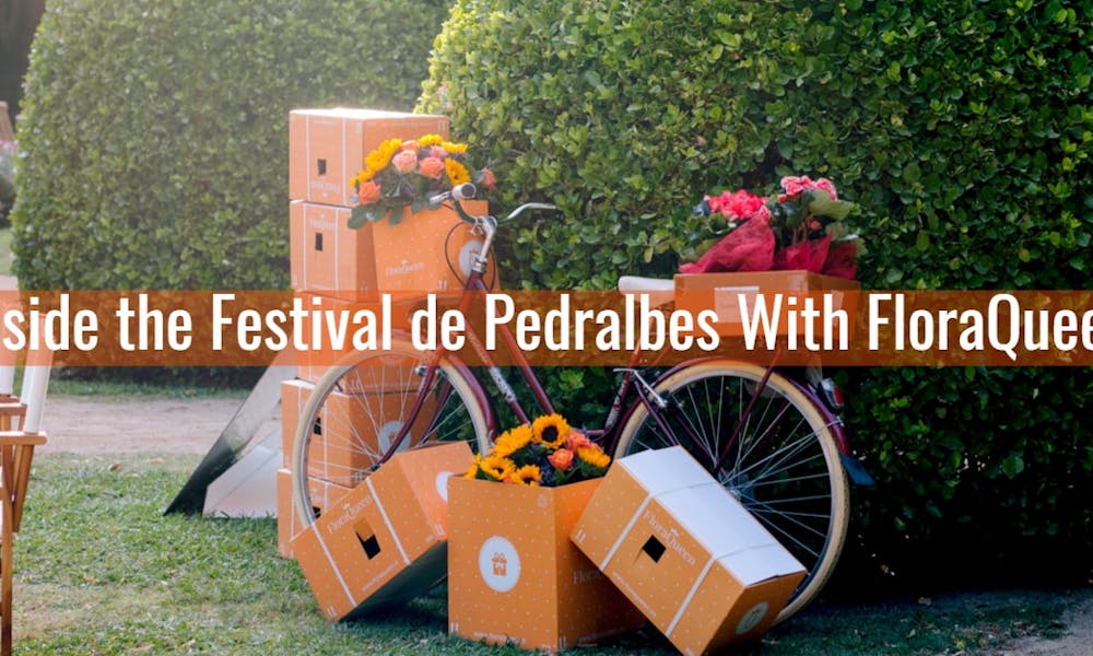 Inside the Festival de Pedralbes With FloraQueen Banner