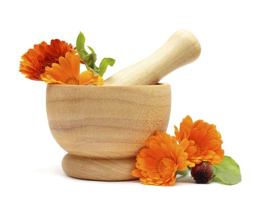 Pestle mortar and flowers