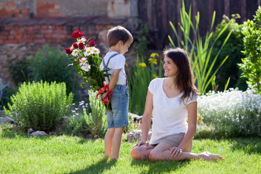 Surprise mom with flowers on Mother’s Day