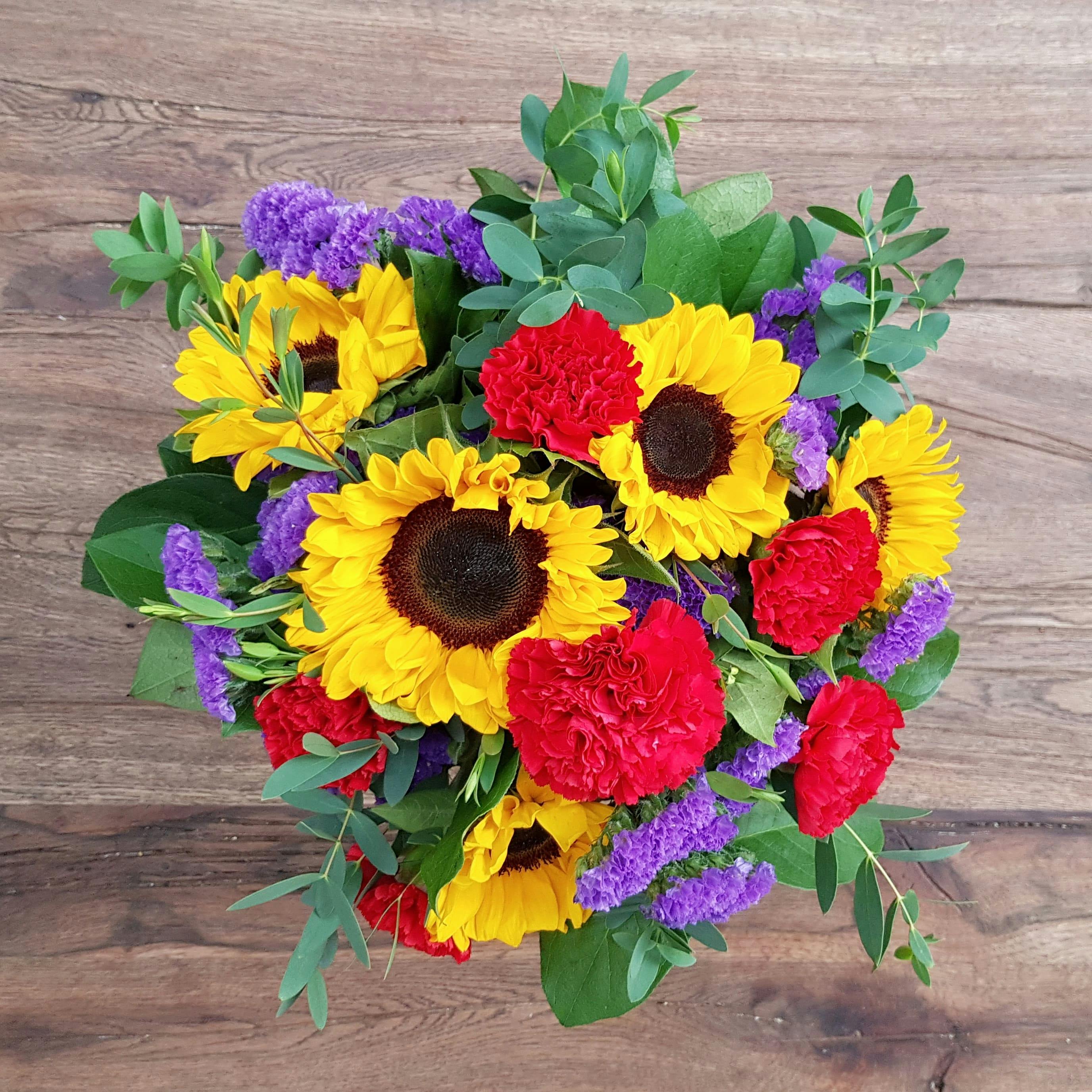 Bouquet di girasoli e garofani