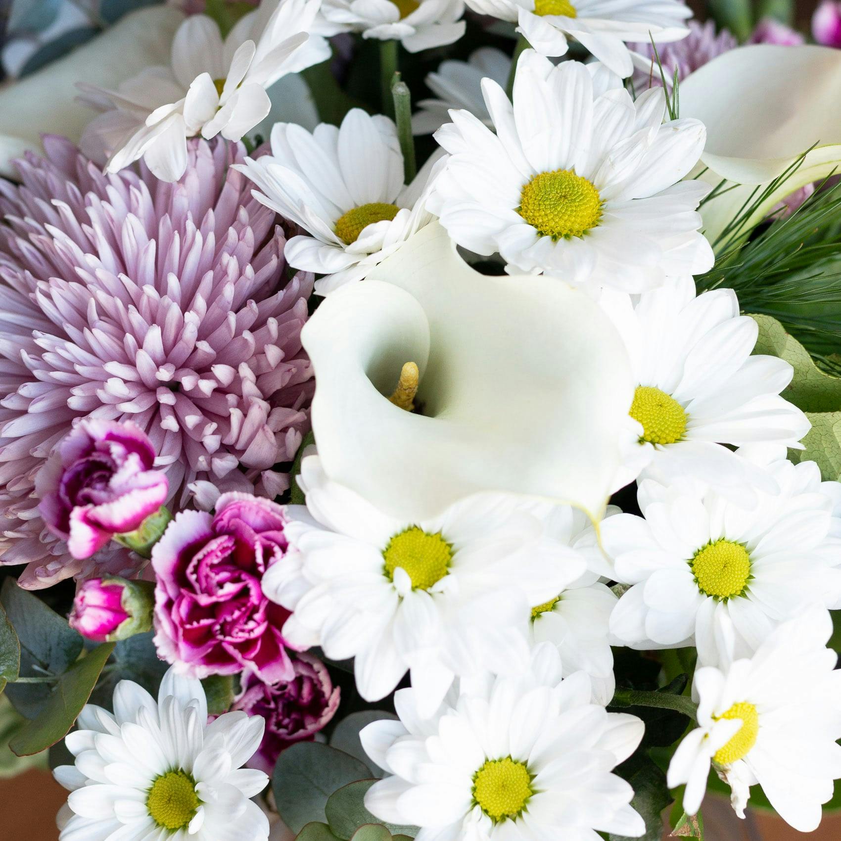 Closeup of serendipity bouquet callas, chrysanthemums