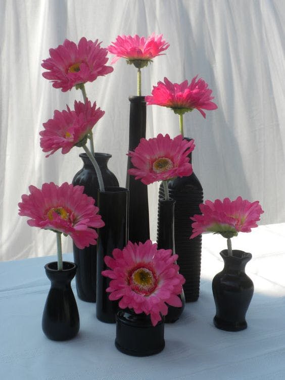 Let your centerpieces play double duty! Set of 8 Vintage Black Painted Bud Vases for centerpieces and wedding favors by TheWeddingDesignShop, $36.00