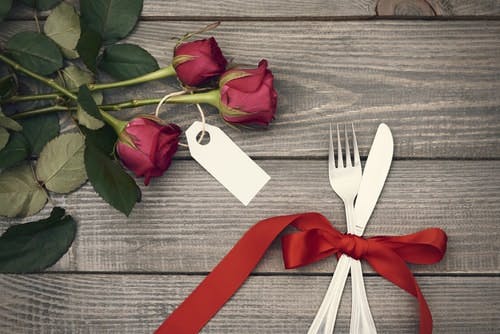 Mystery dinner and red roses.