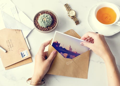 postcard being opened coffee table