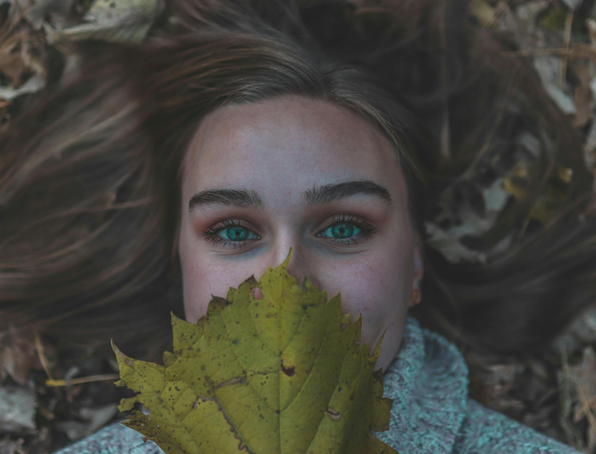 woman-outdoor-laying-on-ground