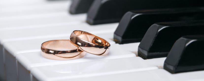 Wedding rings on a piano