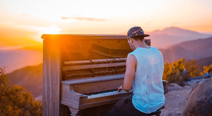 Piano in front of a sunset