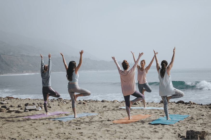 The Flowrise team doing yoga