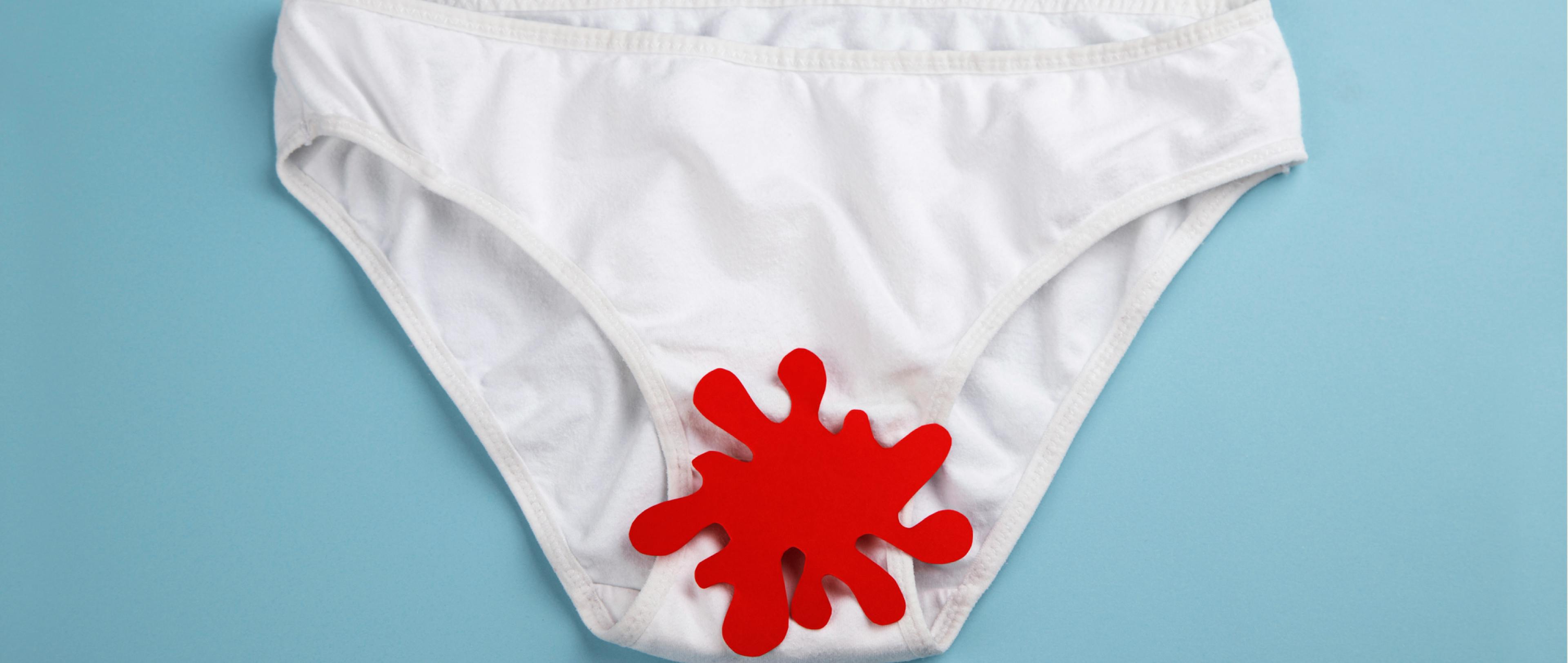 White panties with blood splat on blue background