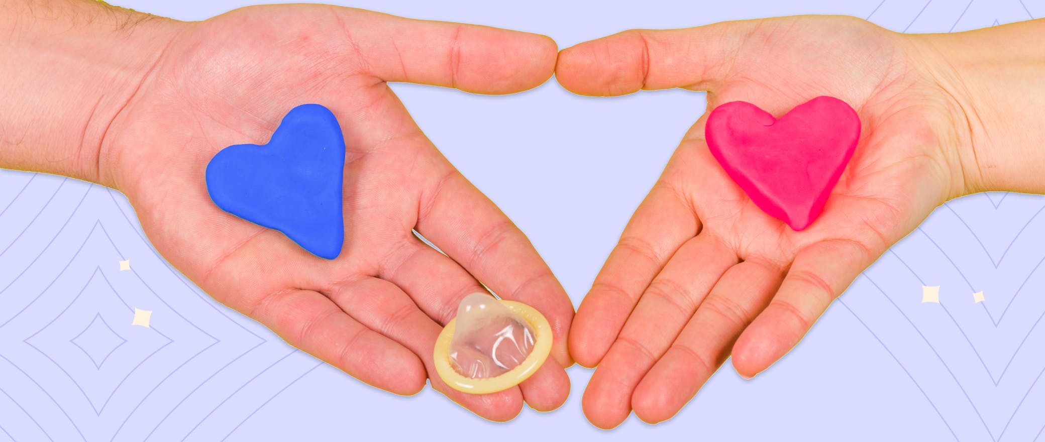 Two hands holding hearts and a condom