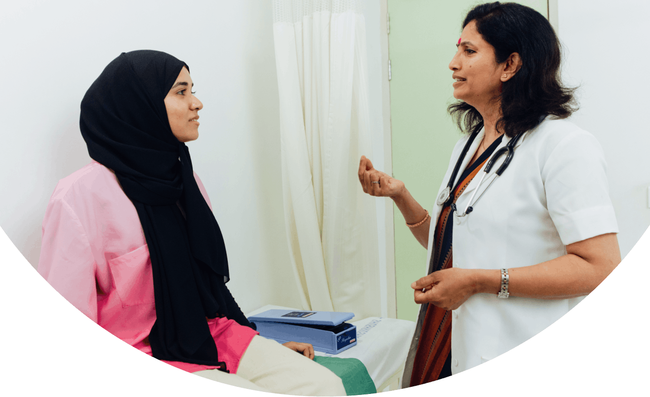 a woman consults a doctor