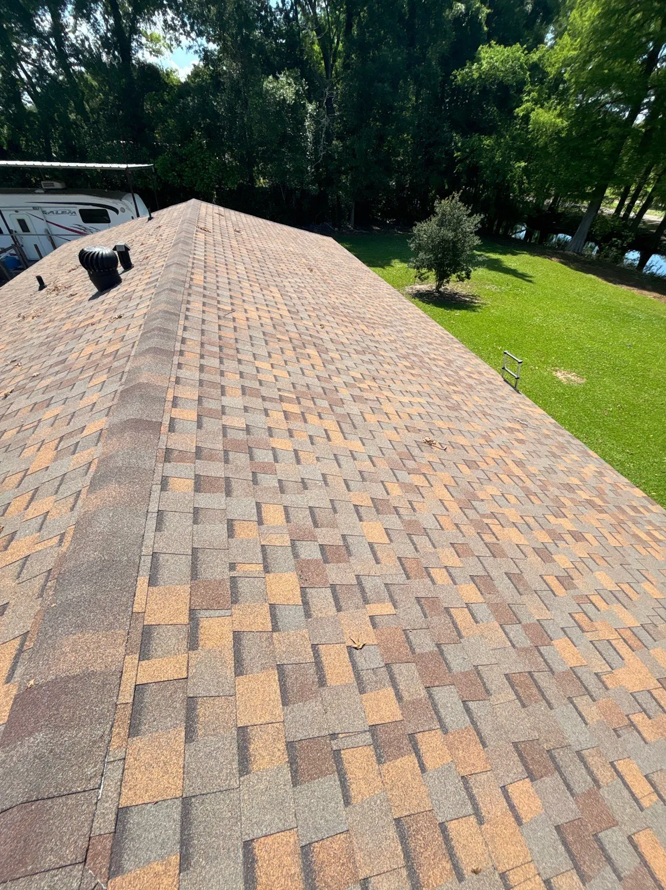 residential asphalt shingle roof replacement with turbine vent and professional roofing ladder - Boise, ID - Flux Boise Roofing & Siding