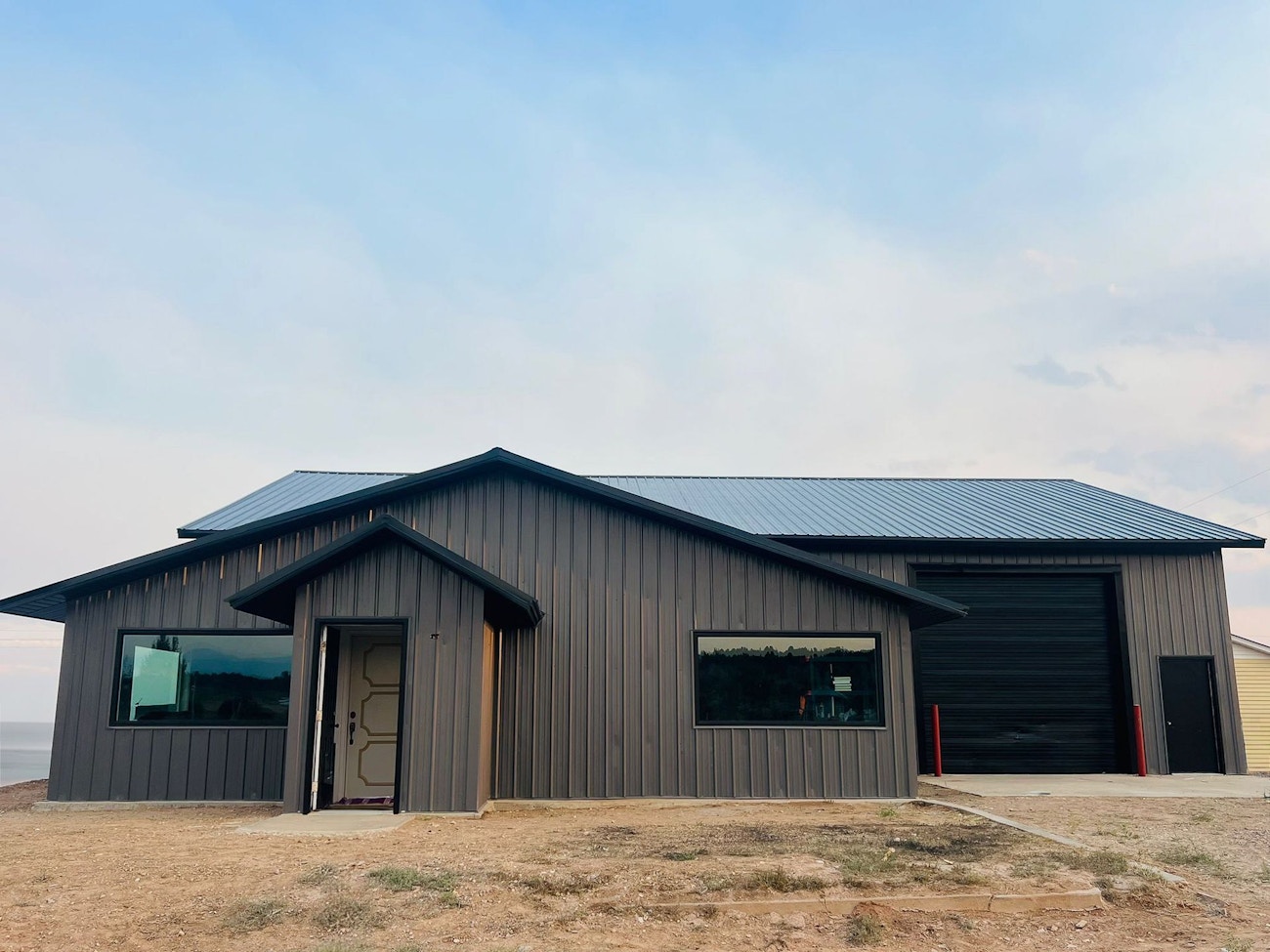 Metal roofing with metal siding