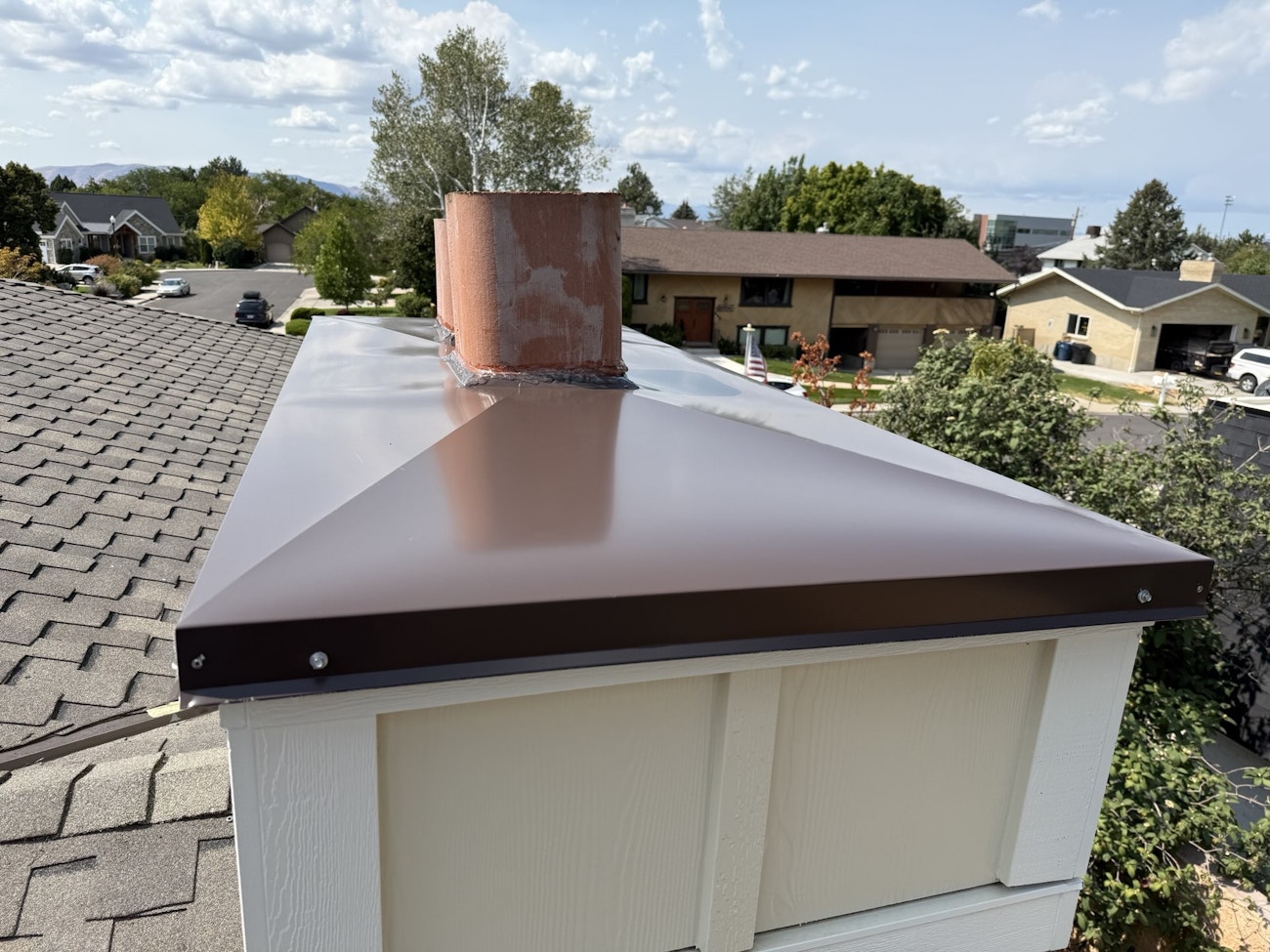 Finished chimney chase on residential roof