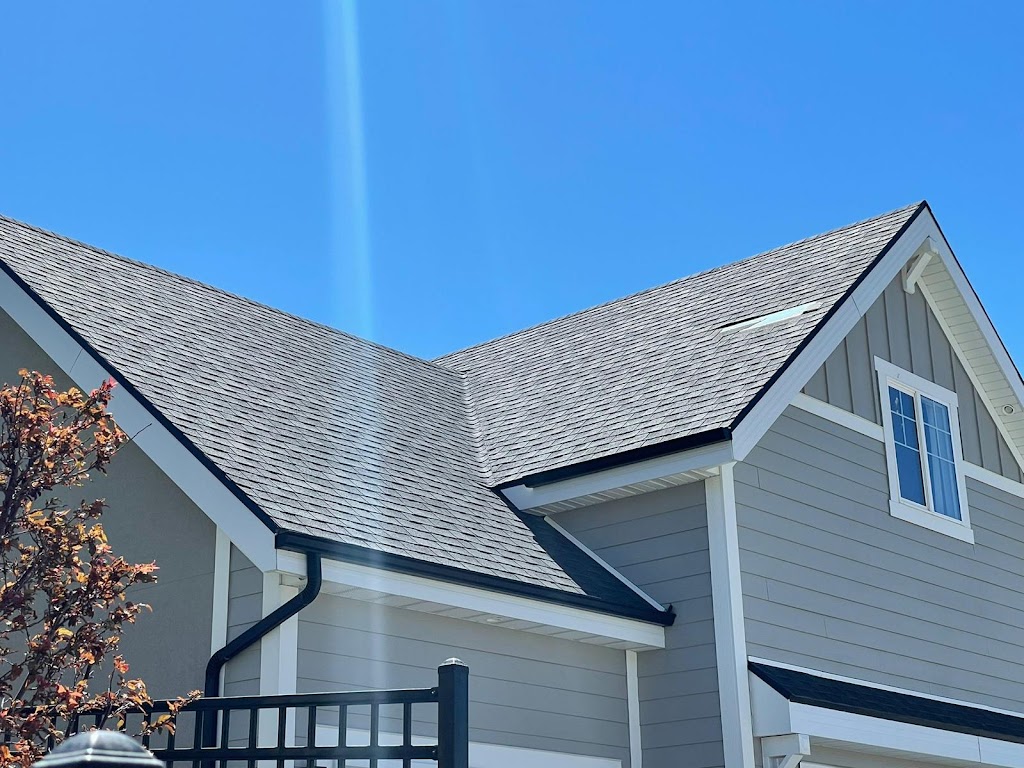 New roof installation with asphalt shingles
