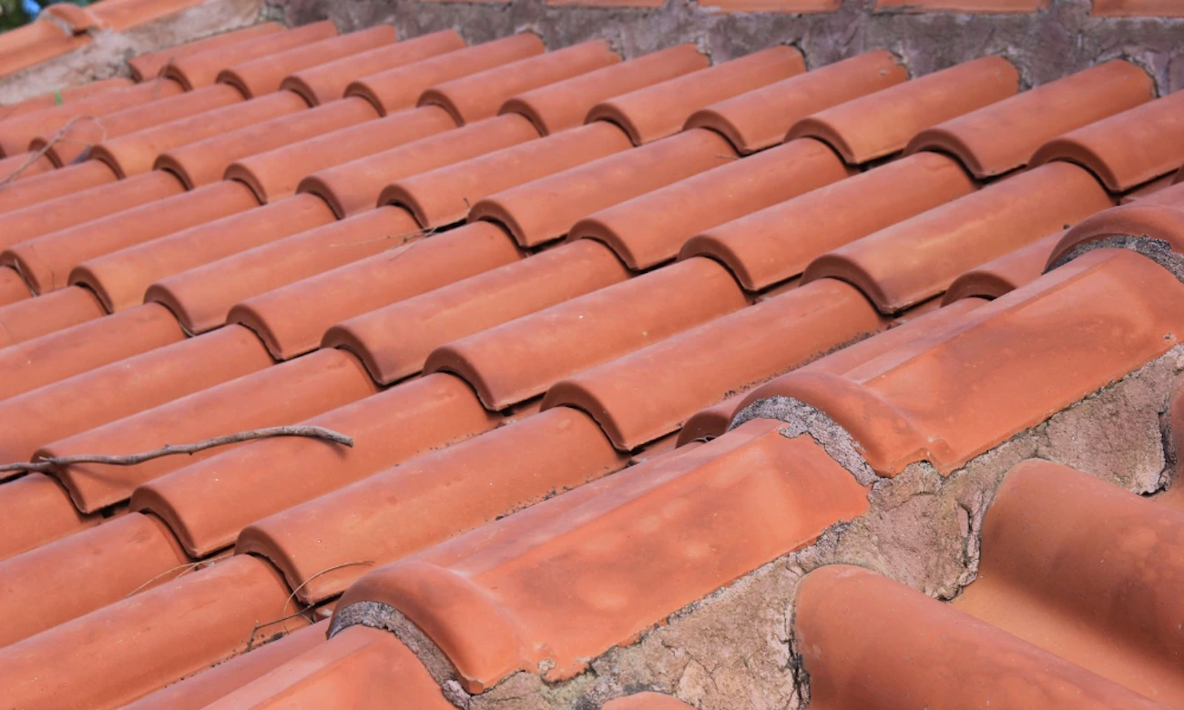 Tile roof repair on home