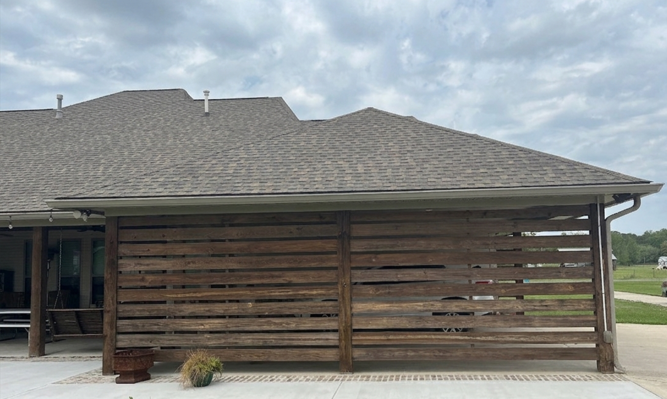 Completed roof with wood privacy