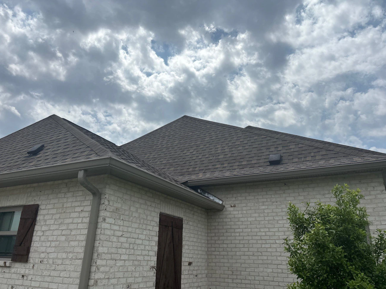 New roof installation with asphalt shingles