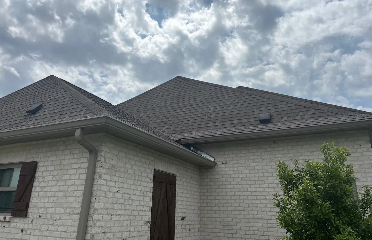New roof installation with asphalt shingles
