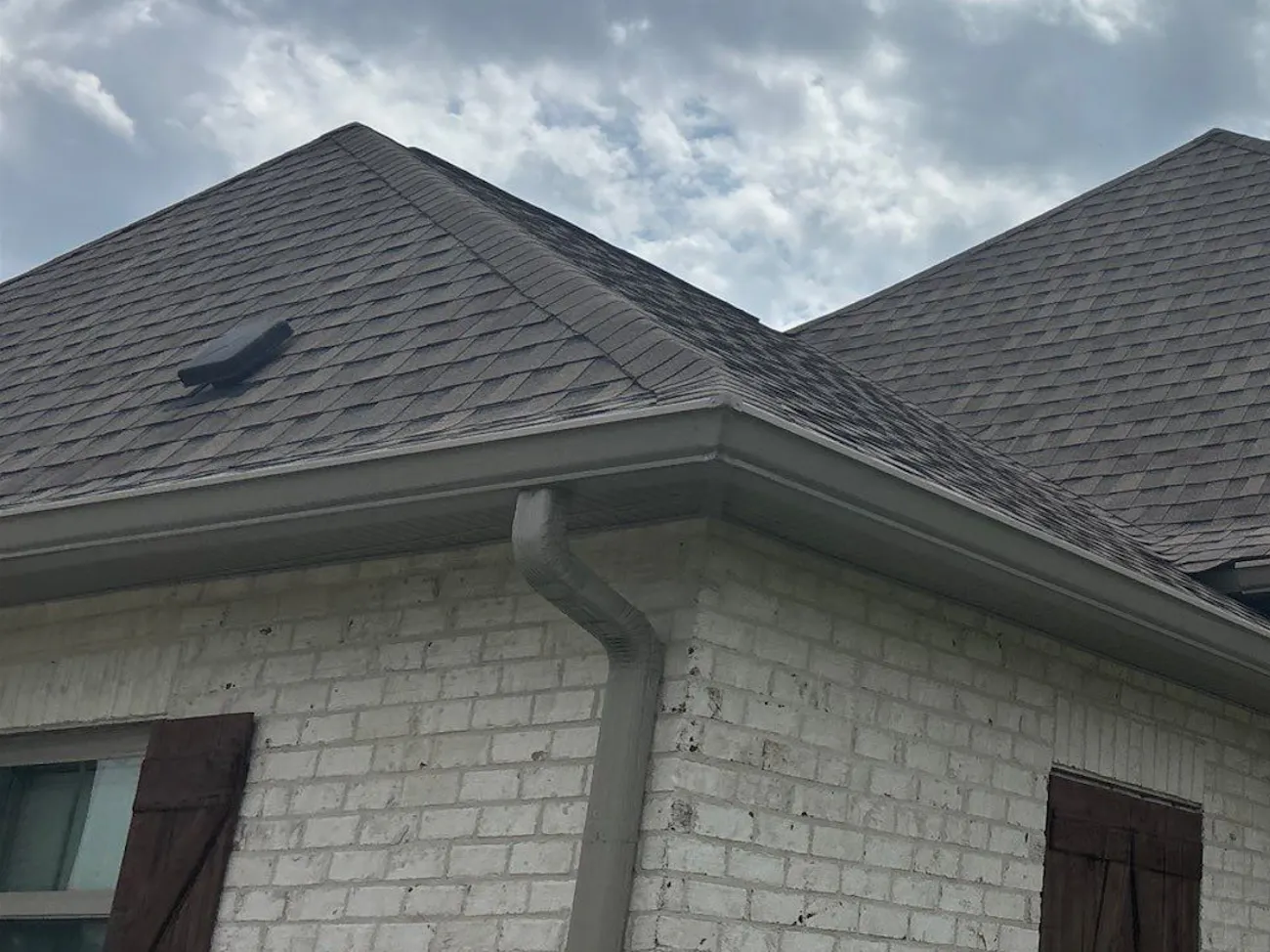 New roof installation with asphalt shingles