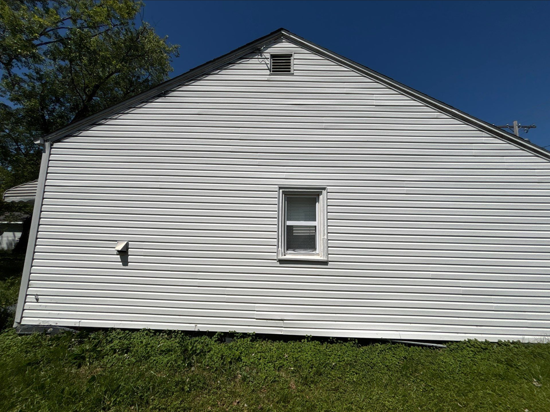 Finished new siding repair
