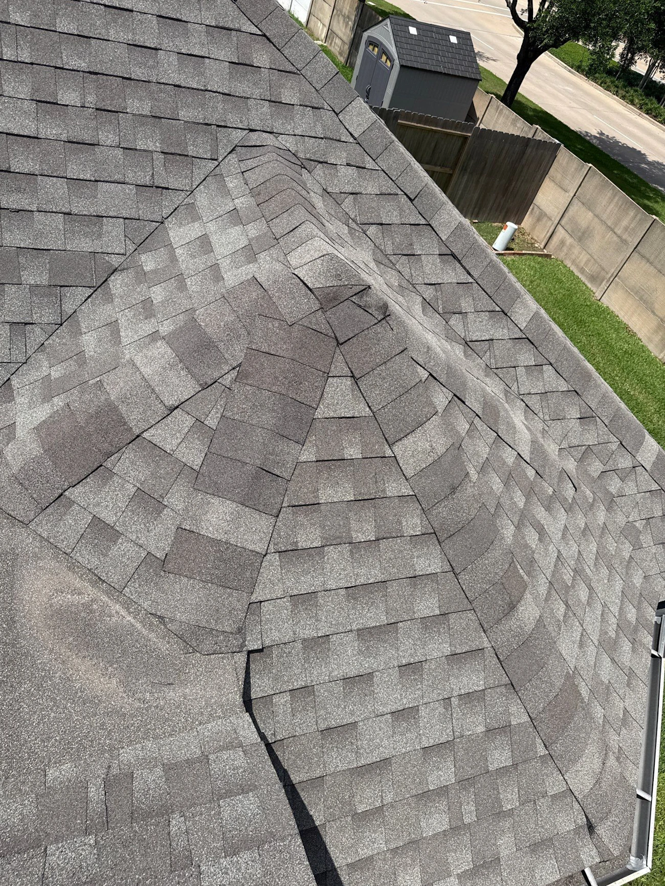 Roof with new shingles on ridges