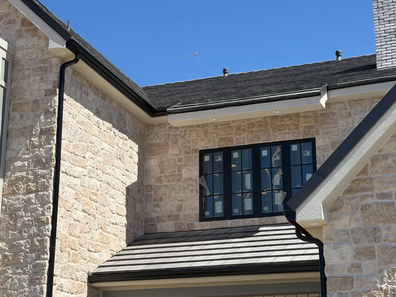 New clean gutters on home exterior