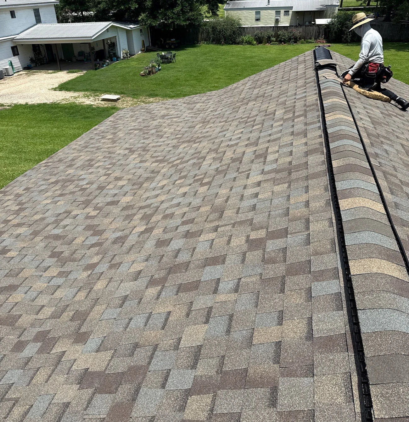 Copy of roofing contractor installing ridge cap shingles on residential roof replacement project - Boise, ID - Flux Boise Roofing & Siding