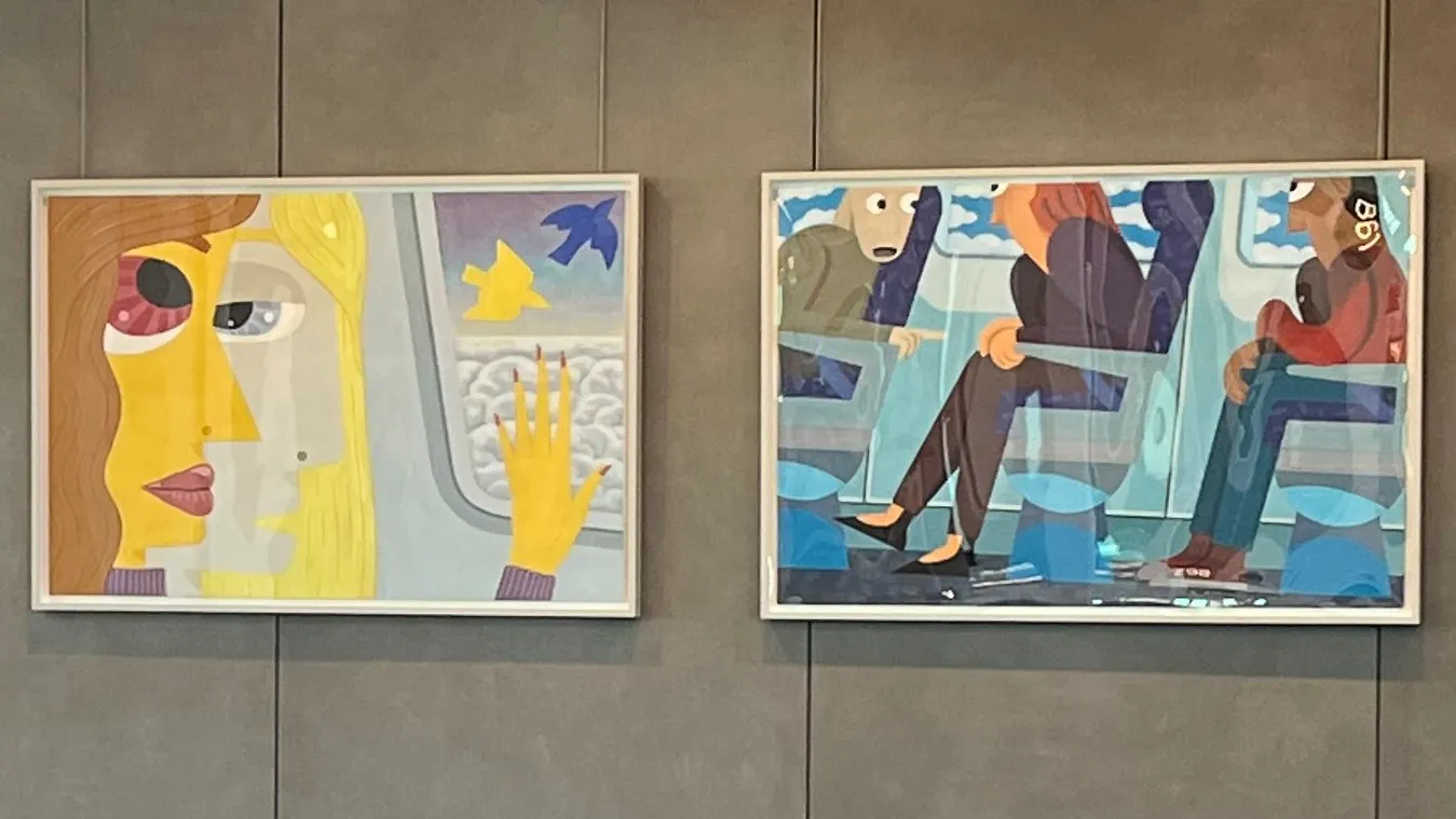 Three colorful paintings depicting stylized passengers on airplanes, each framed and mounted on a gray wall. The left shows a woman looking out a window with birds outside. The center shows multiple seated passengers. The right shows a woman pointing out a window with butterflies flying by.
