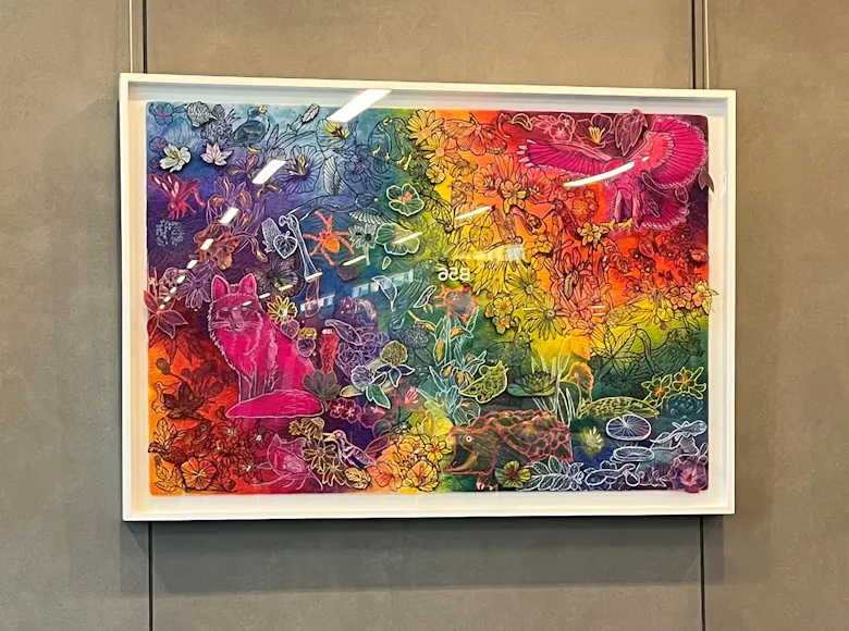 Triptych of vivid, rainbow-hued illustrations filled with whimsical animals, plants, and fantastical creatures layered in intricate detail across energetic, swirling backgrounds.