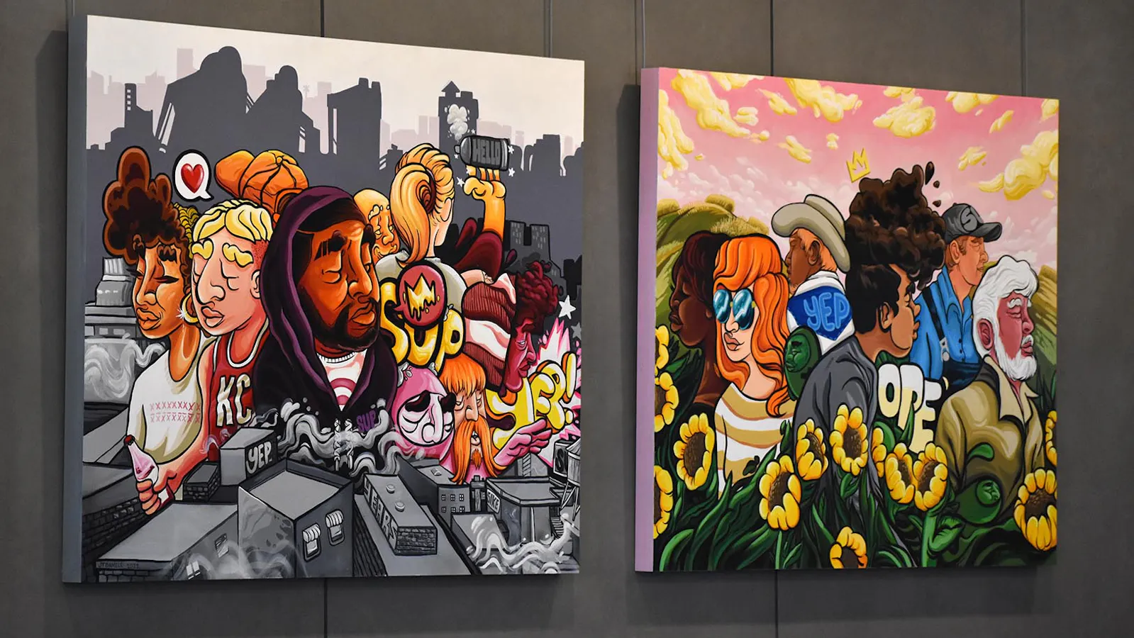 Two vibrant paintings side by side—one depicting stylized urban characters amid city rooftops and graffiti, the other showing diverse figures in a sunflower-filled rural landscape under a pink sky.