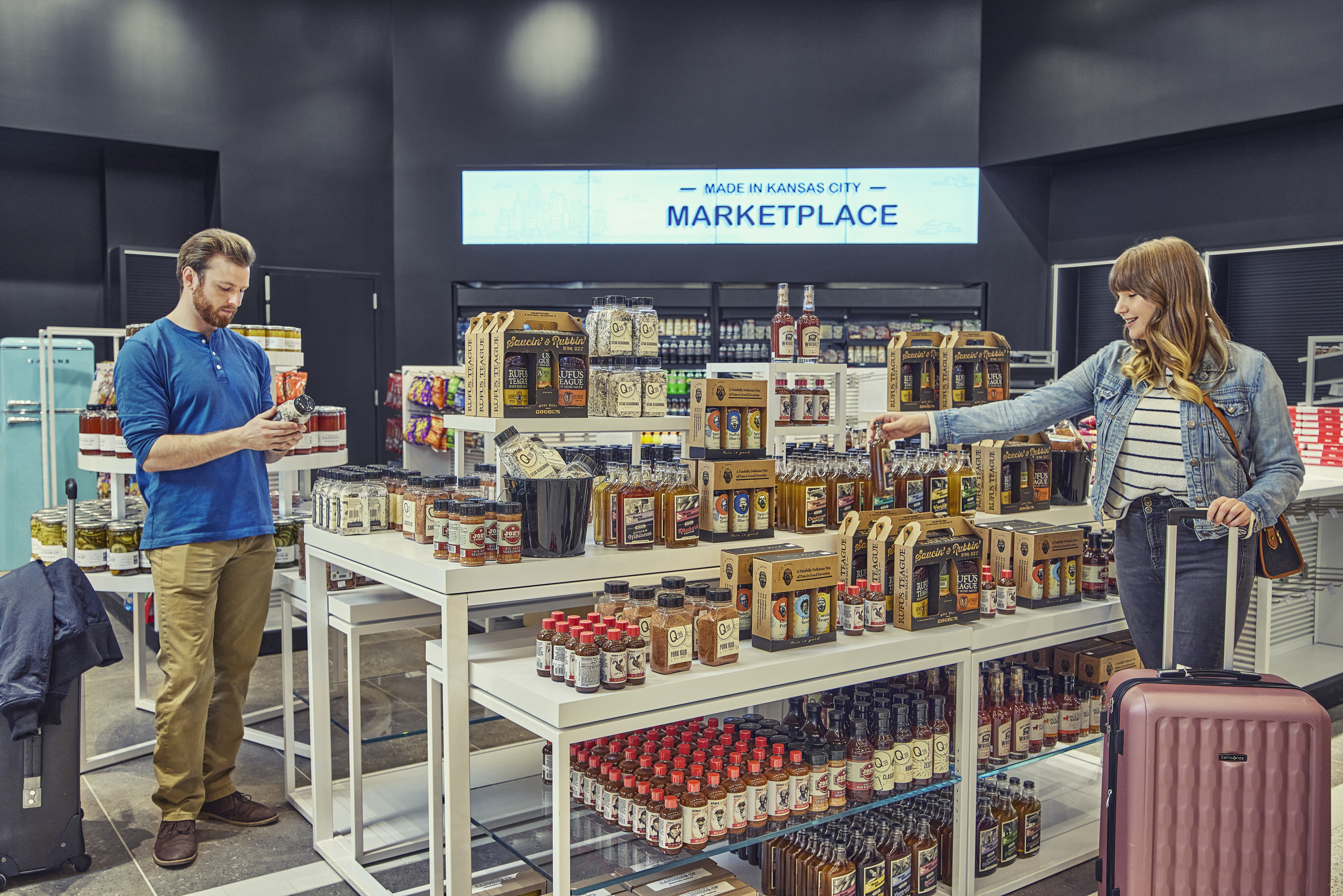Travelers shopping at Made In KC at the airport