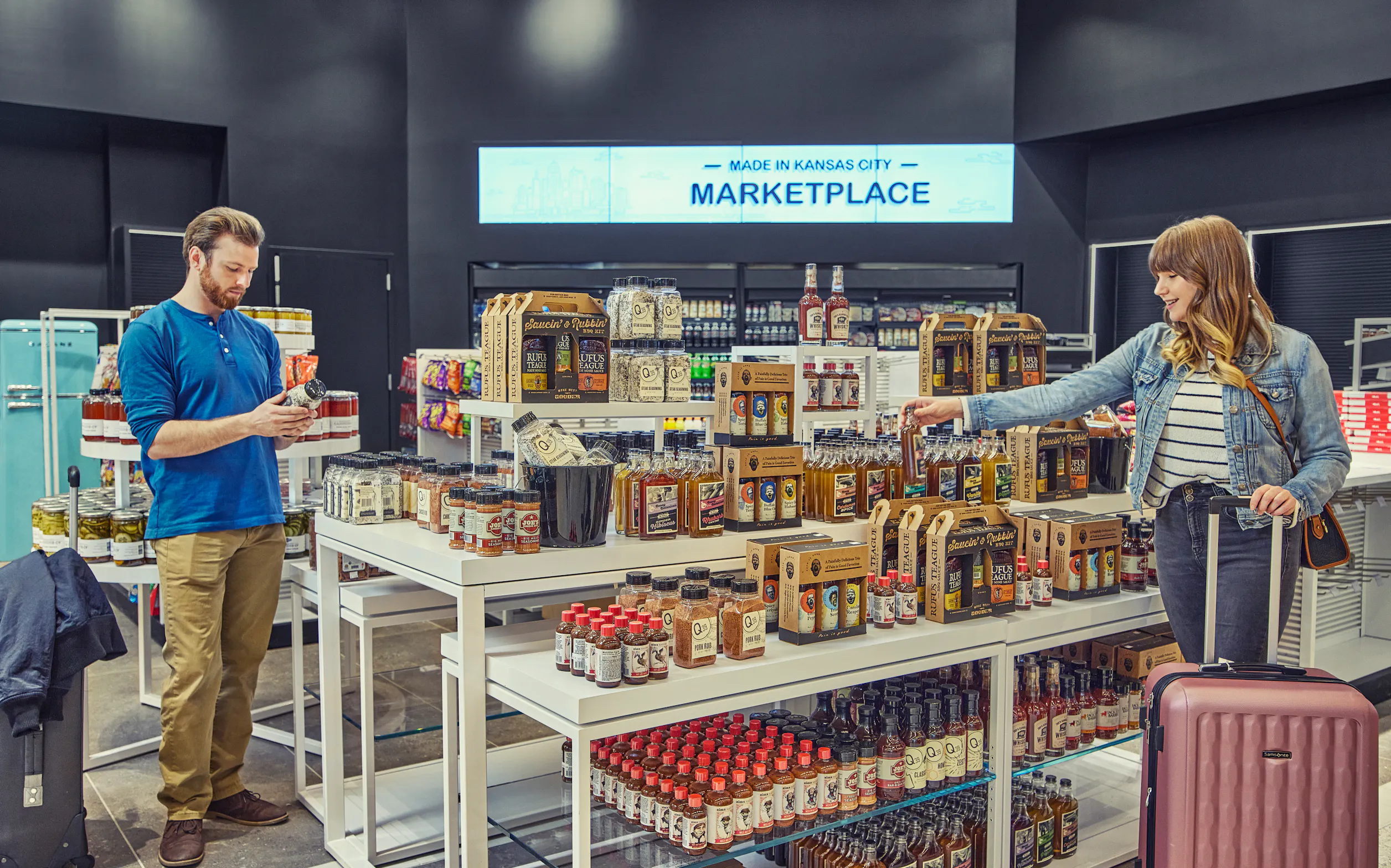 Travelers shopping at Made In KC at the airport