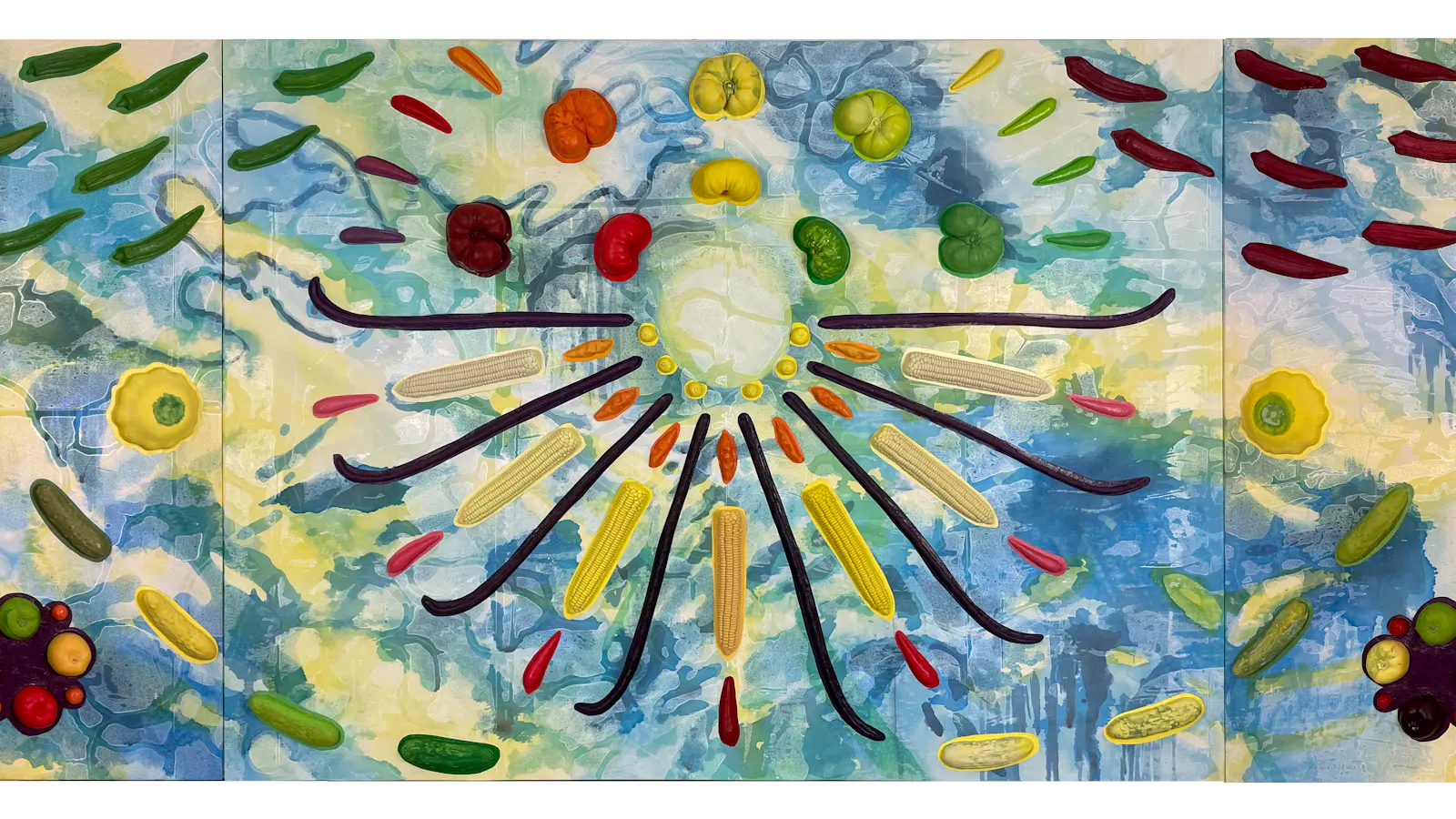 Colorful abstract artwork featuring botanical forms and microscopic shapes radiating symmetrically across a cloud-like blue and green background.