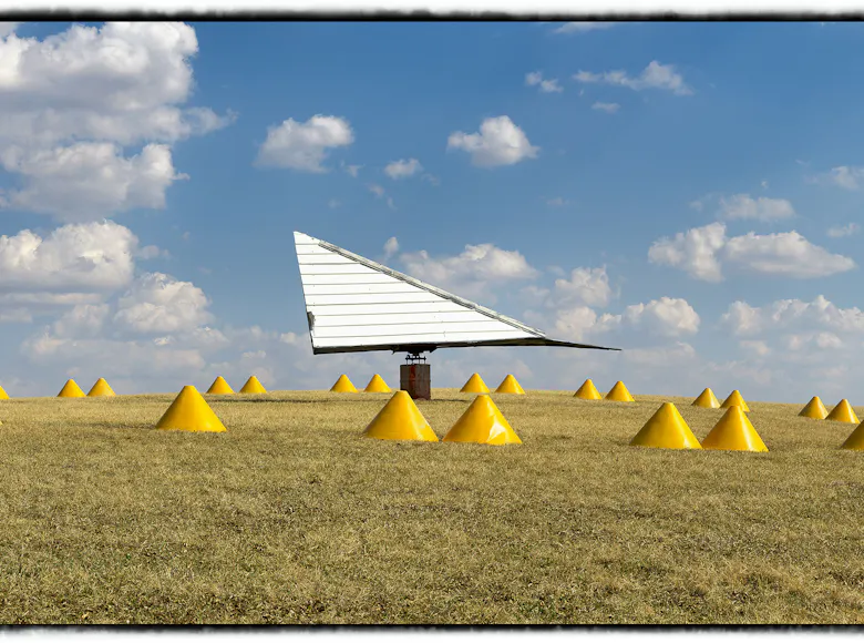 An artistic triptych portrait of a pyramid-shaped wind direction indicator placed near runways to guide aircraft takeoffs and landings.
