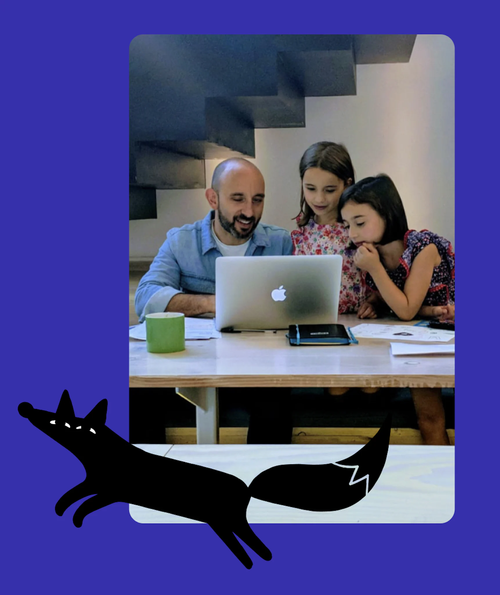 Fold7 employees at a computer