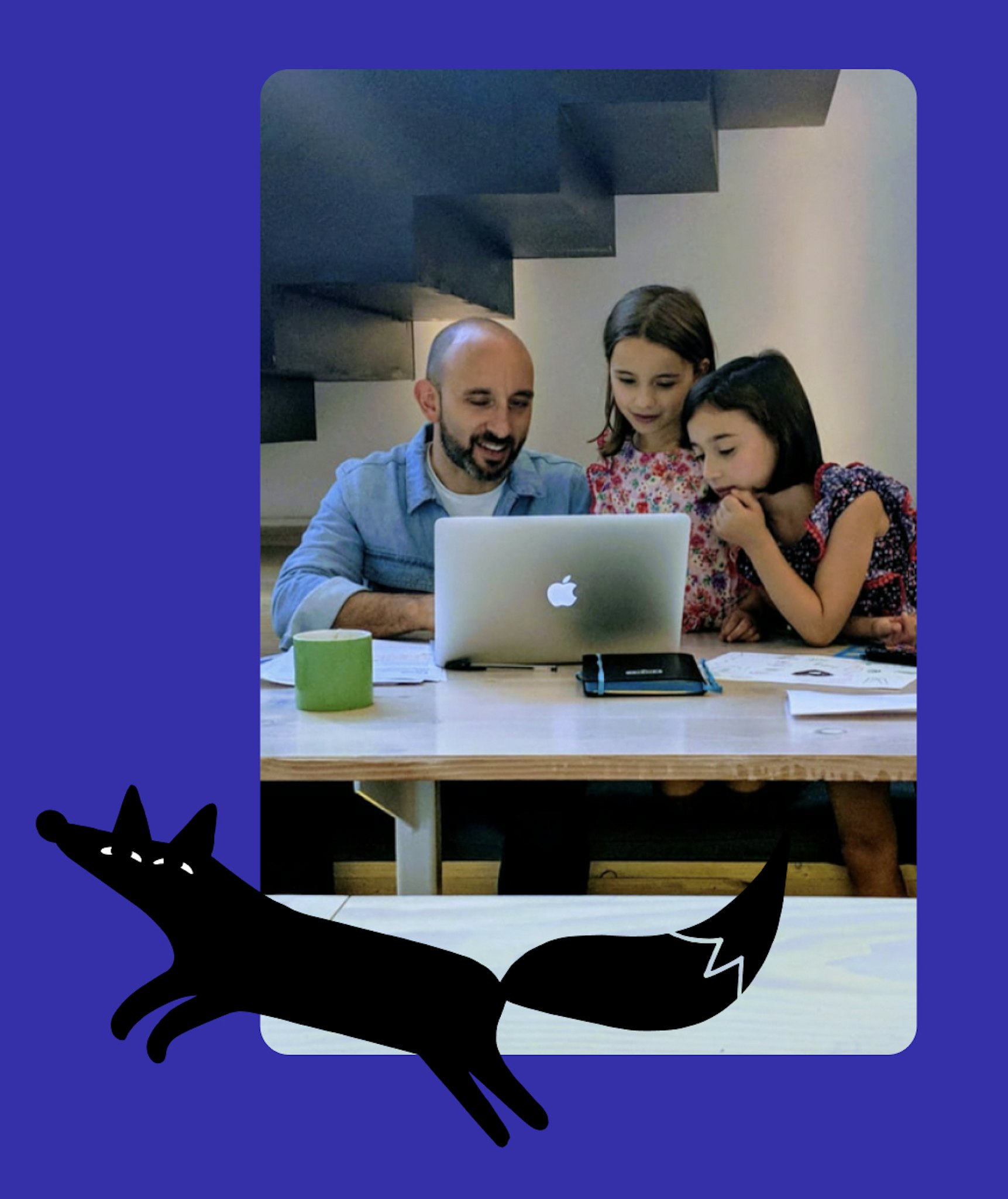 Fold7 employees at a computer