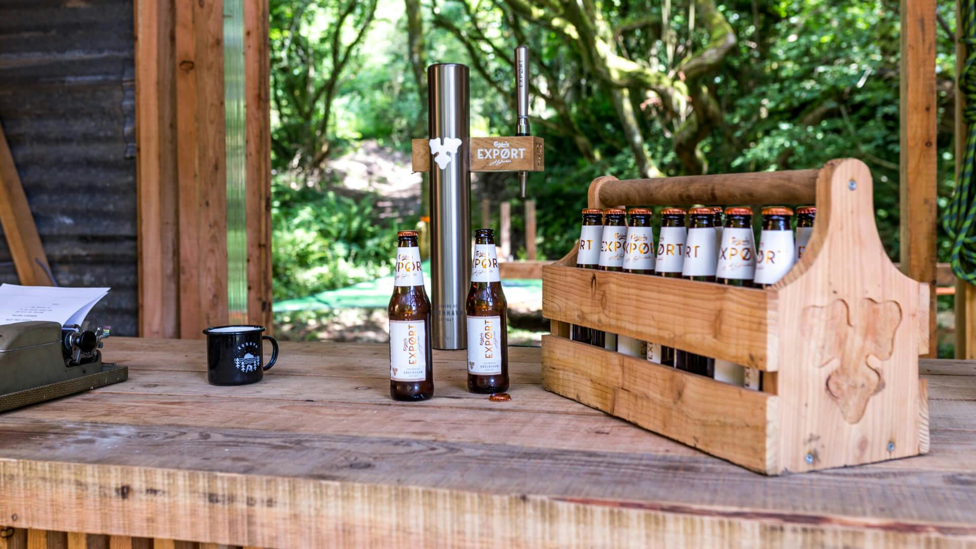 Beers in a rack - Carlsberg The Cabin