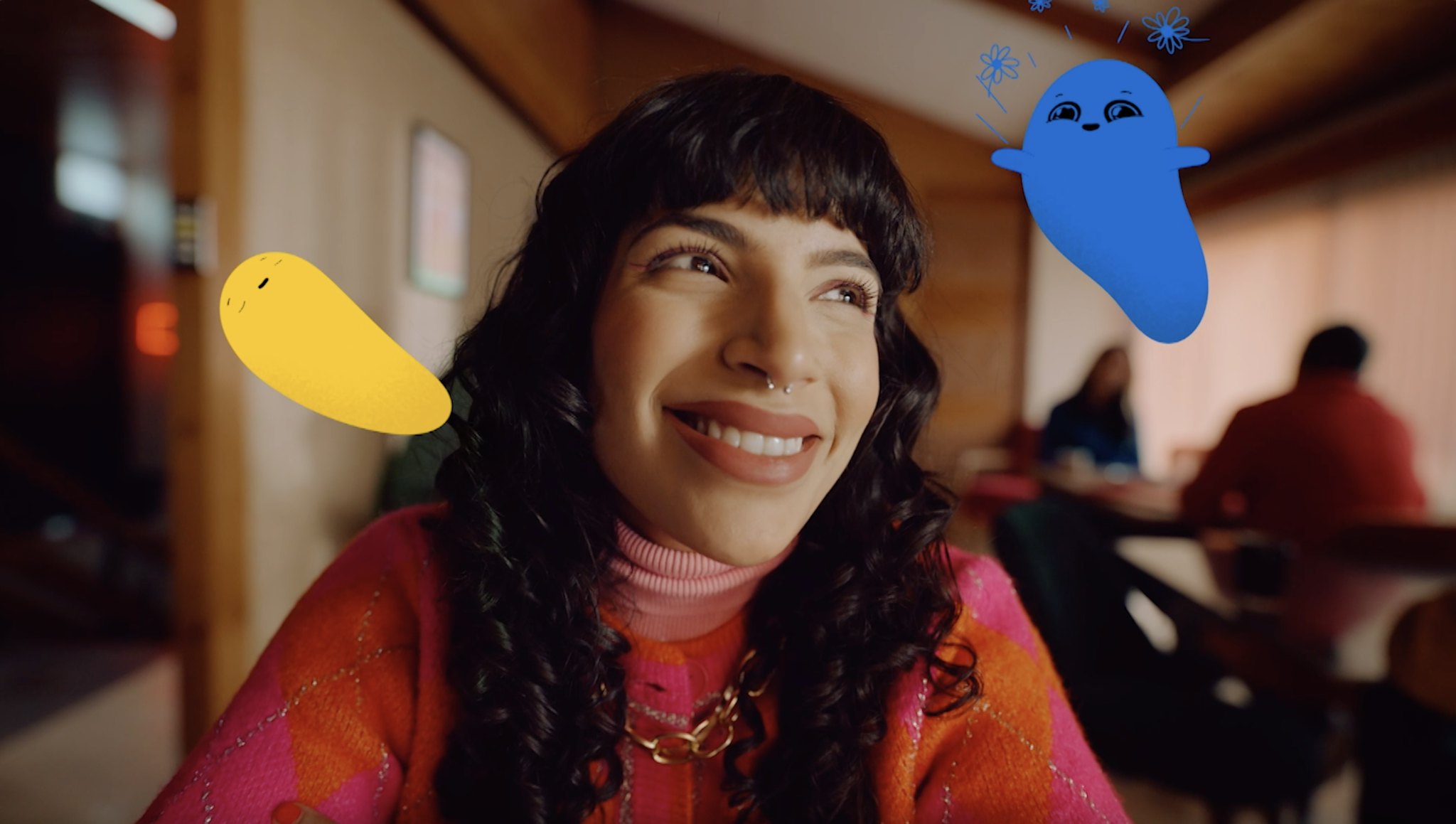 Woman smiling with graphic emotions