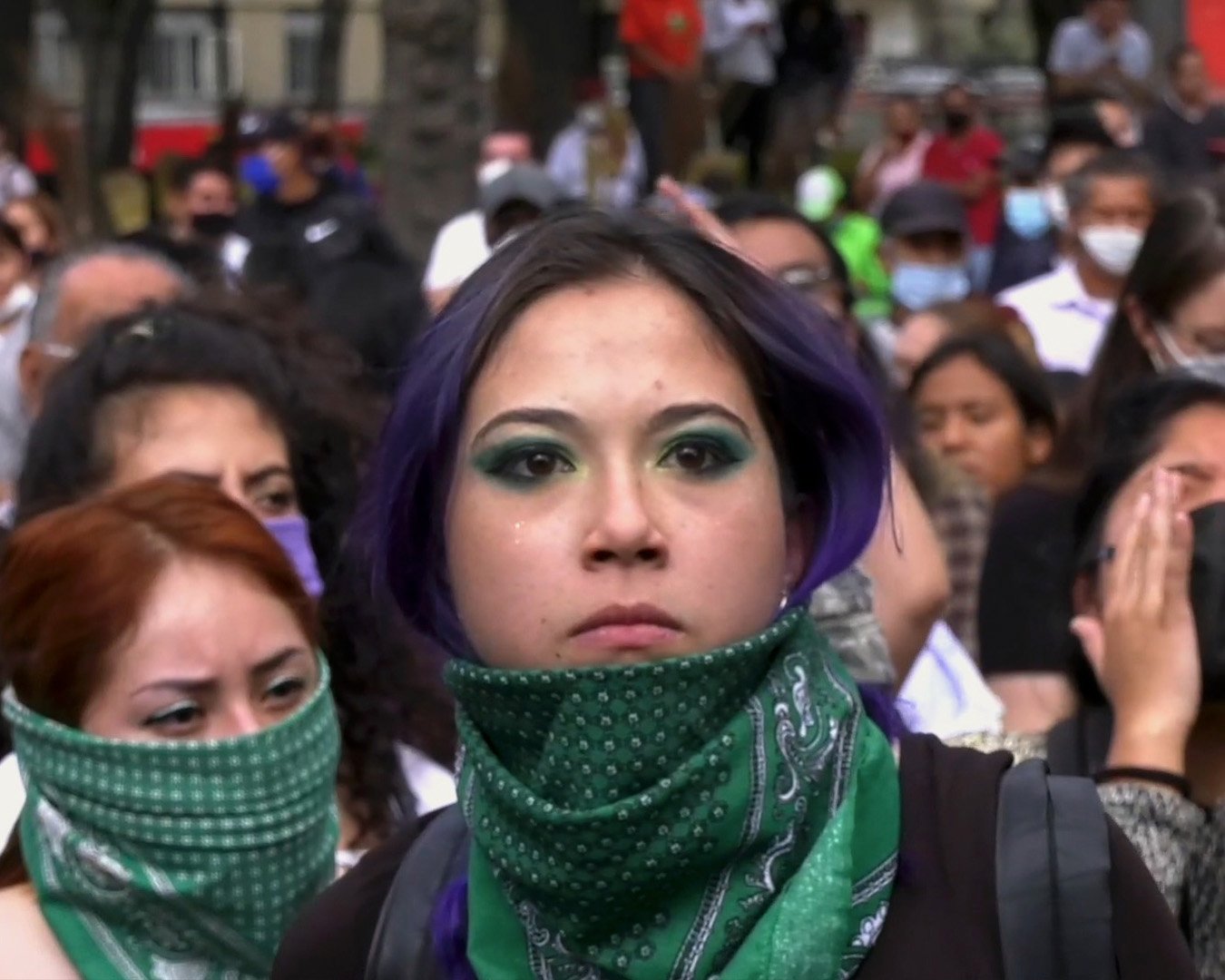Woman with purple hair at protest