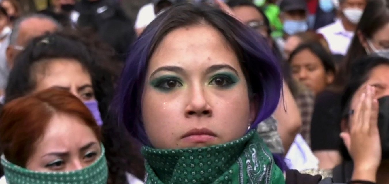 Woman with purple hair at protest