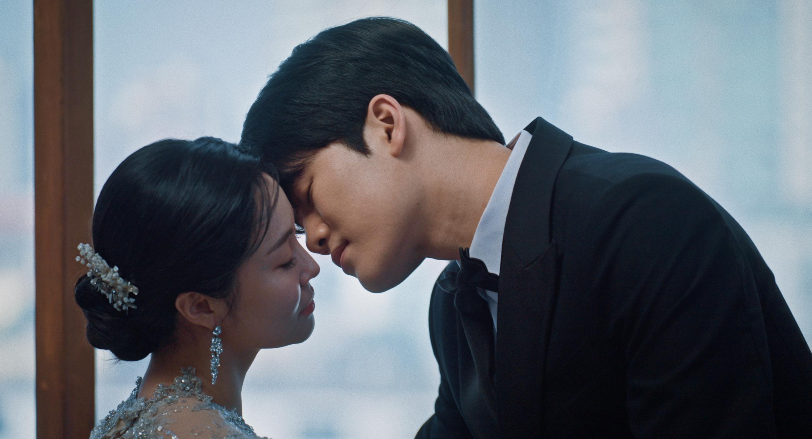 a romantic couple kiss